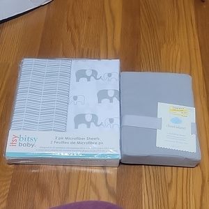 Gray crib bedding seats. Elephant 🐘
